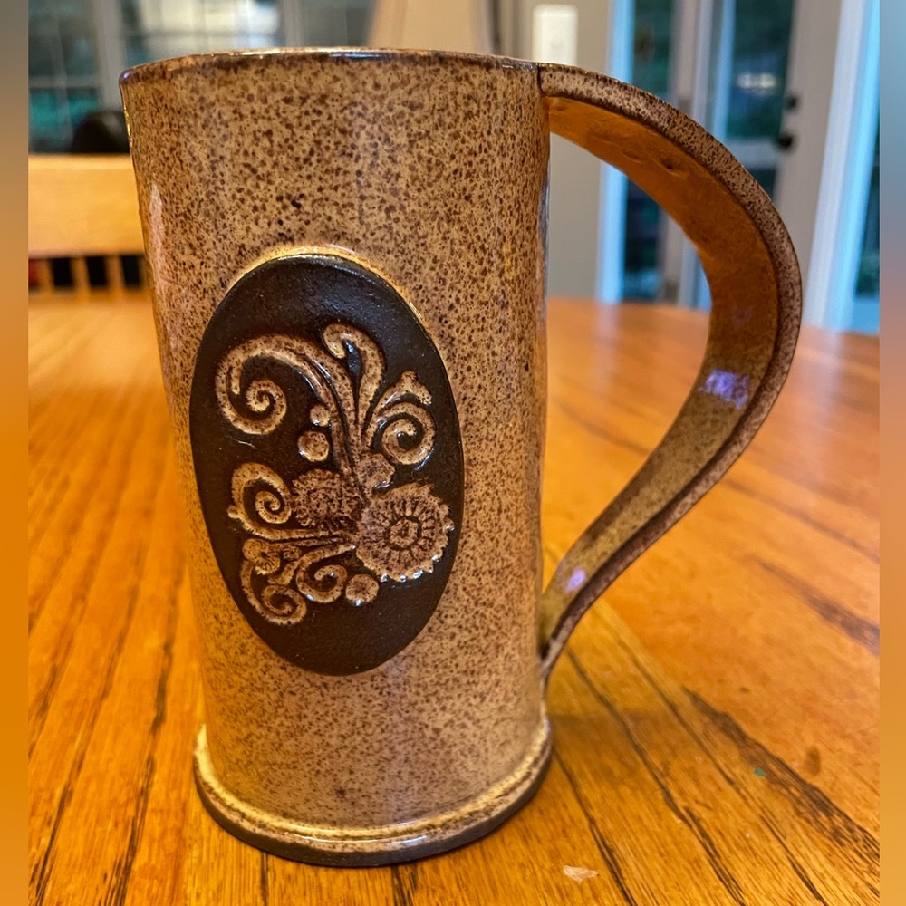 Hand made slab pottery mug, signed and well made with applied embossed detail
